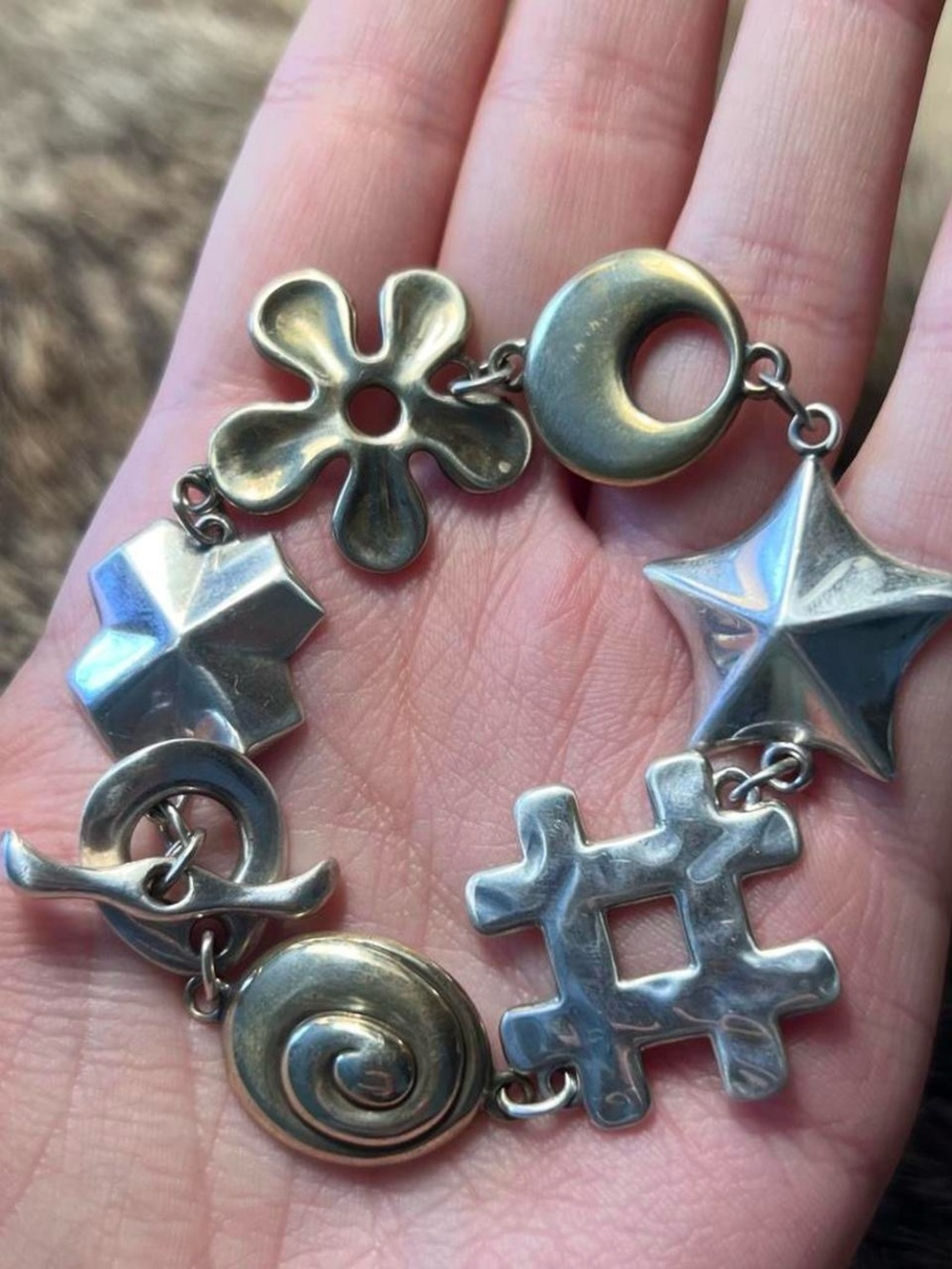 Sterling silver and brass Robert Lee Morris abstract hippy sign bracelet